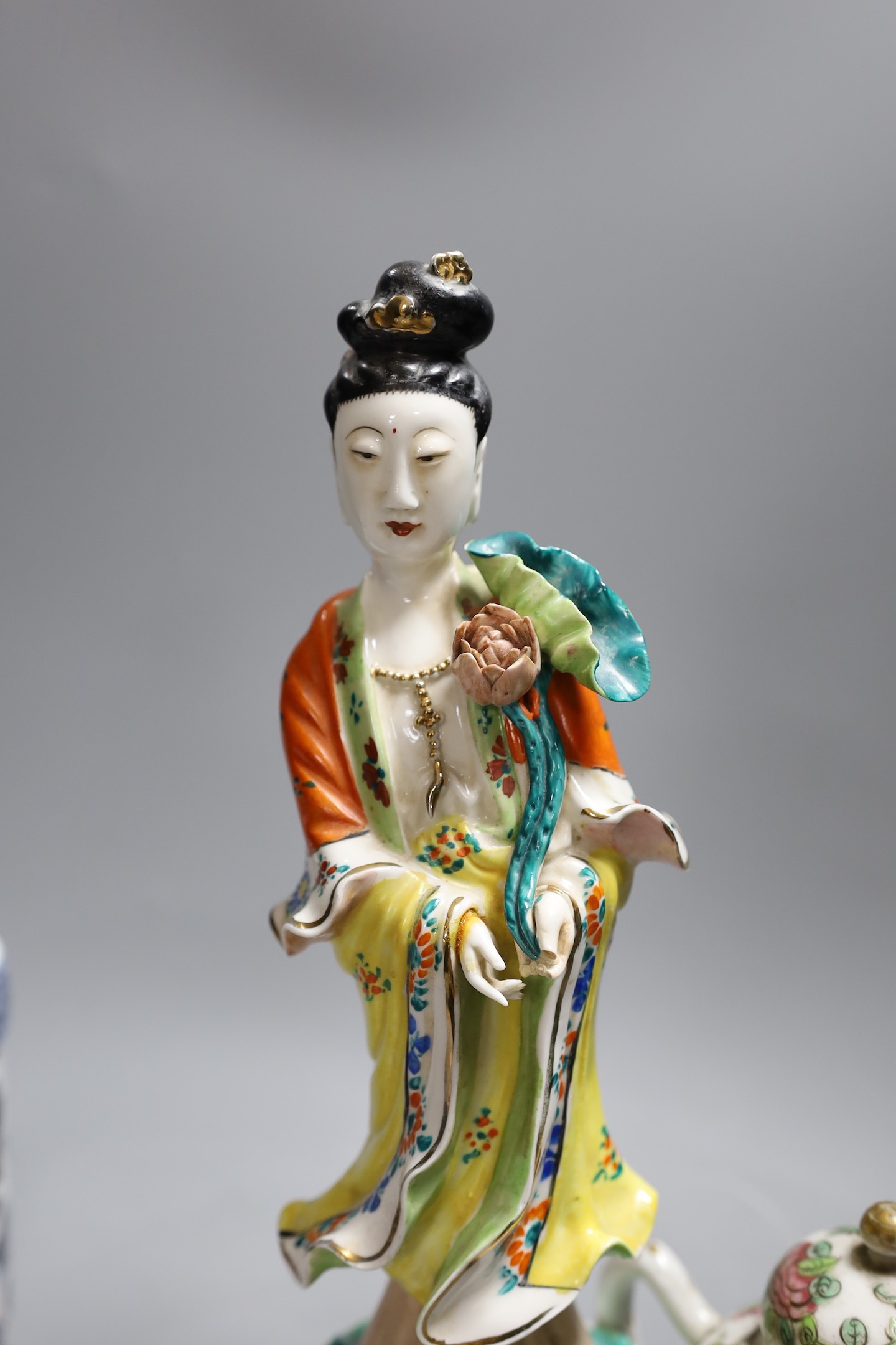 A group of mixed Asian ceramics, figurine 30 cms high